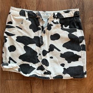 Cow print mini jean skirt